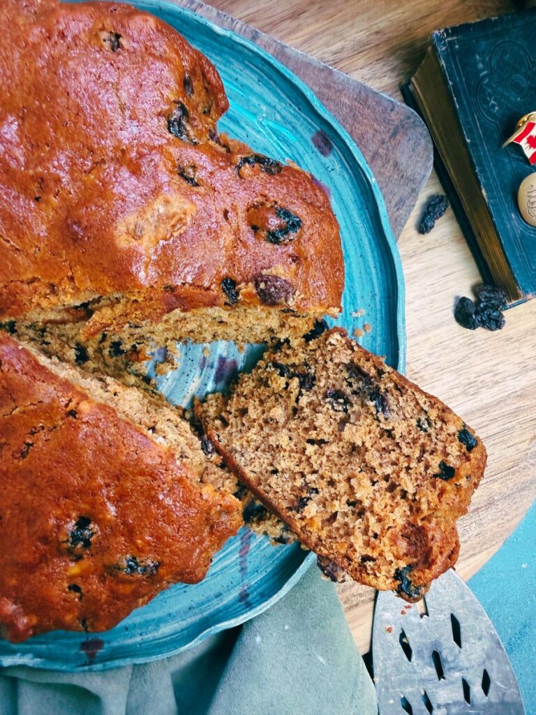 A War cake with one slice cut and on it's side.