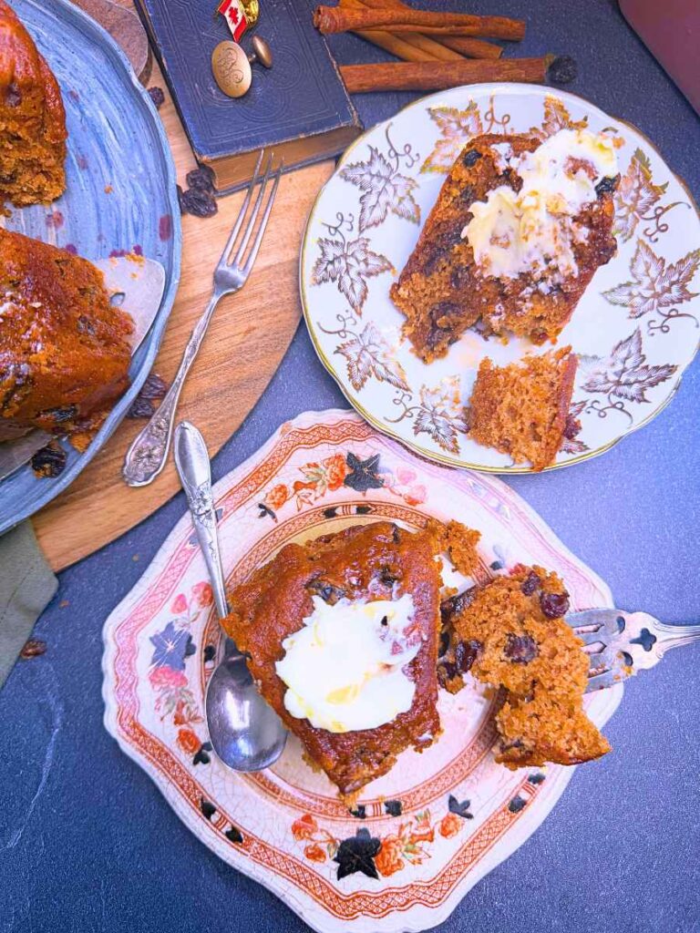 Two servings of war cake. They each have a bit of butter on top.