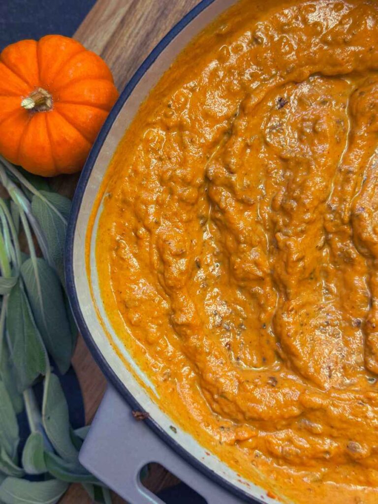Pumpkin pasta sauce in a large grey pot.